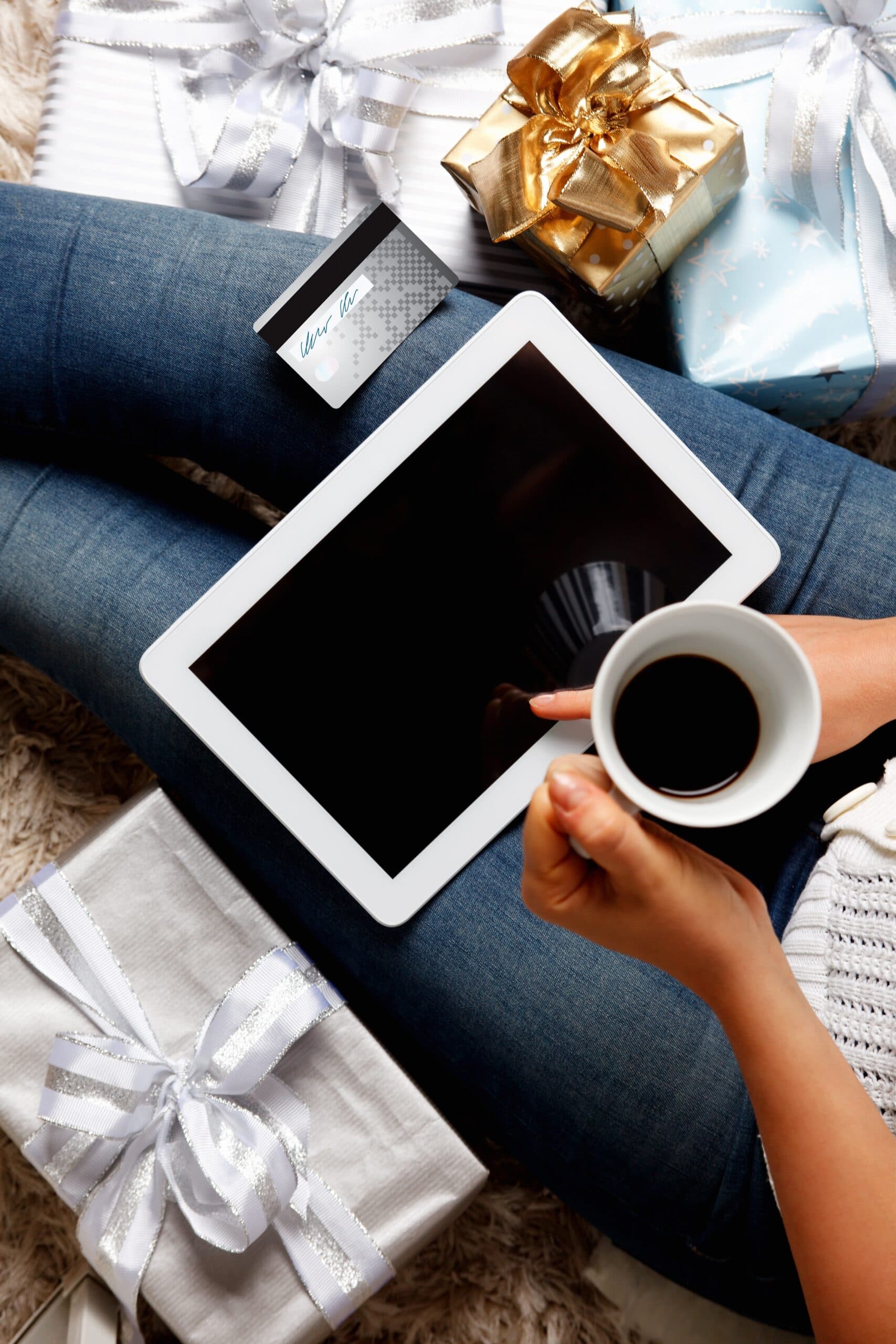 A cup of coffee and a tablet