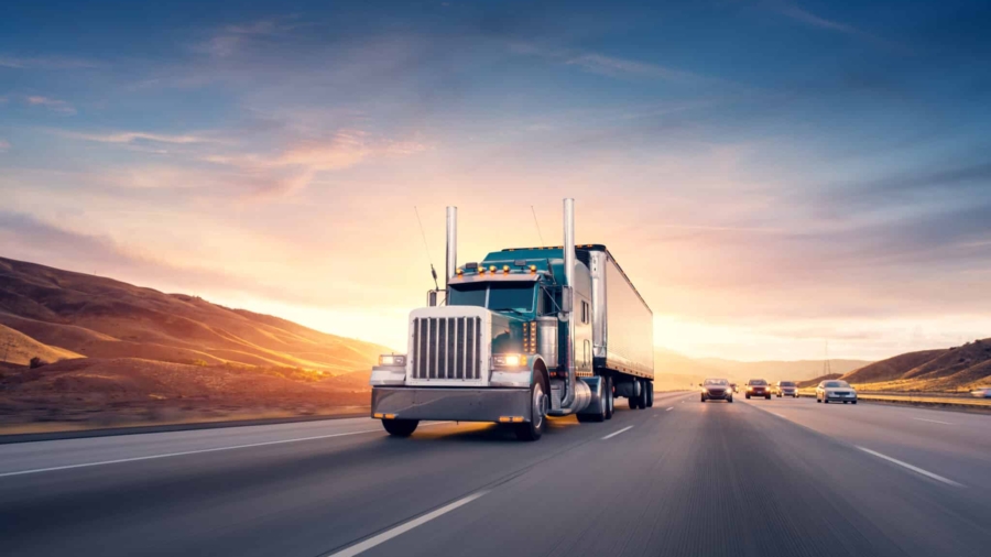 American,Style,Truck,On,Freeway,Pulling,Load.,Transportation,Theme.,Road