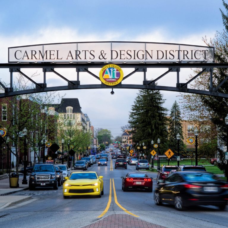 cars under a carmel sign