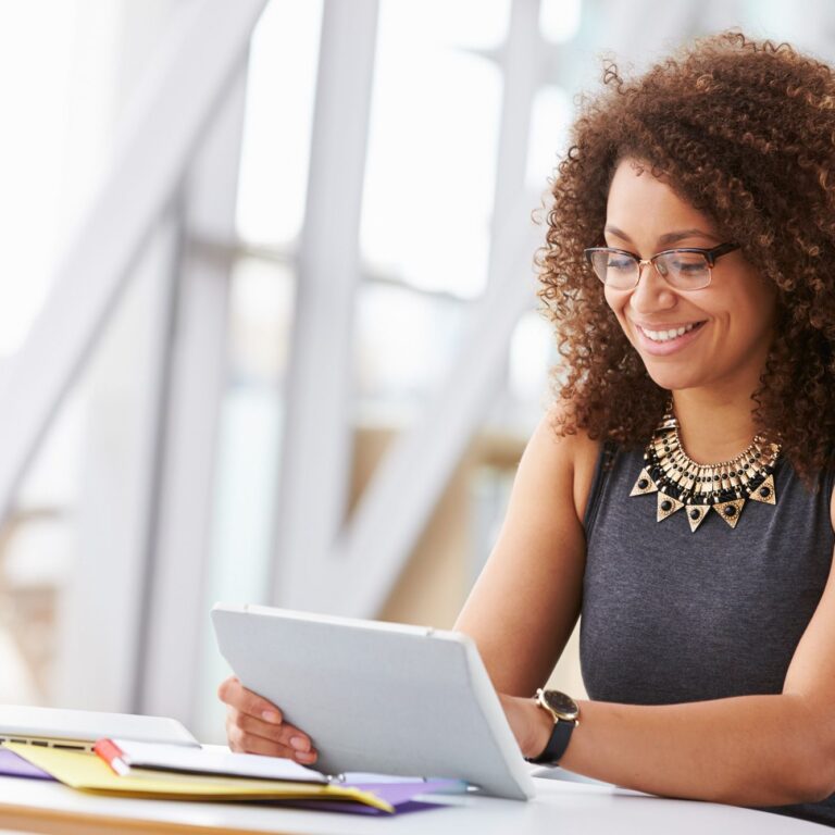 woman using microsoft power platform to save time with code application