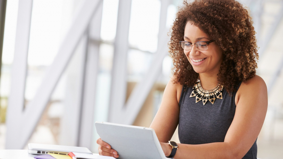 woman using microsoft power platform to save time with code application