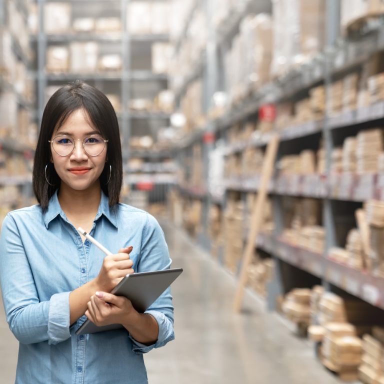 a lady in a warehouse
