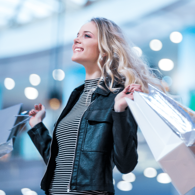 A woman holding shopping bags