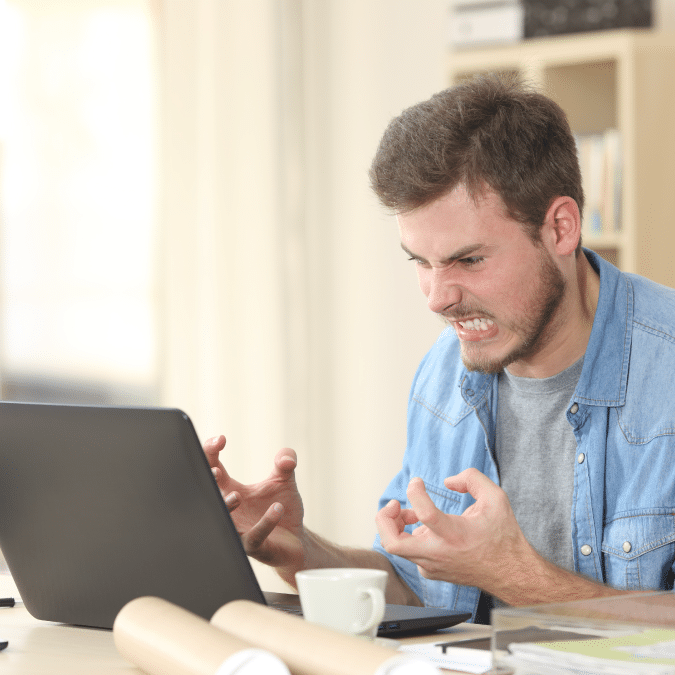 a man on a computer