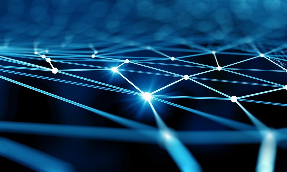 A digital illustration of interconnected glowing blue lines and white nodes on a dark background, representing a network or neural connections in a futuristic style.