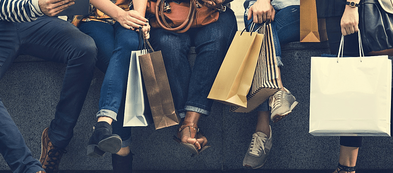 retail shoppers with shopping bags