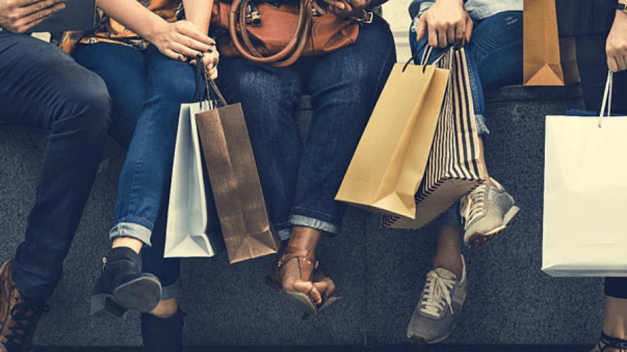 retail shoppers with shopping bags