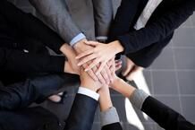 Coworkers displaying unity