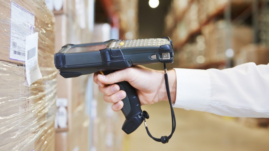 A barcode being scanned on a package