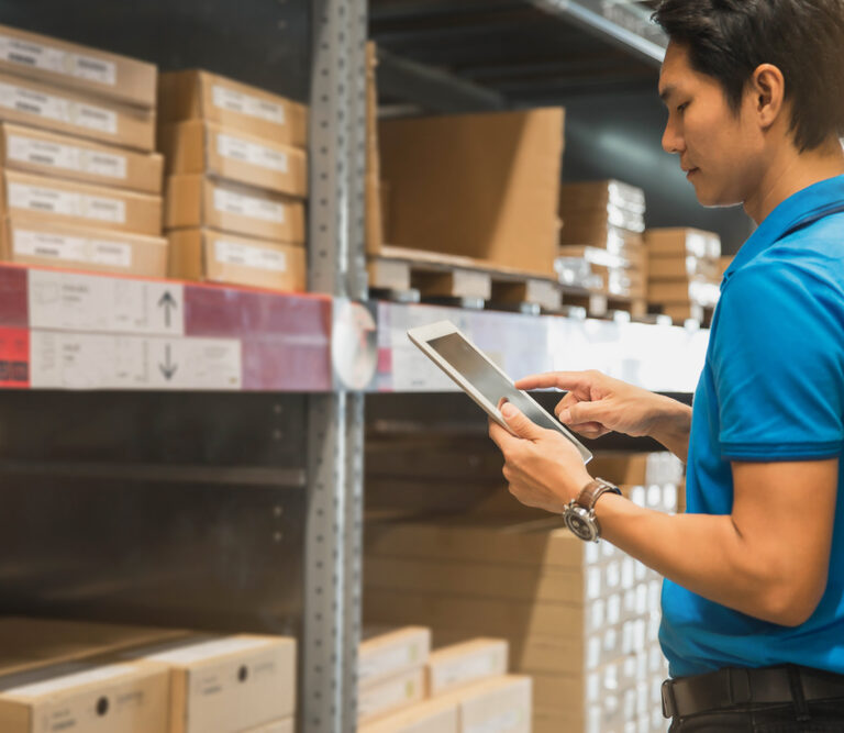 An employee working in a growing microfulfilment center