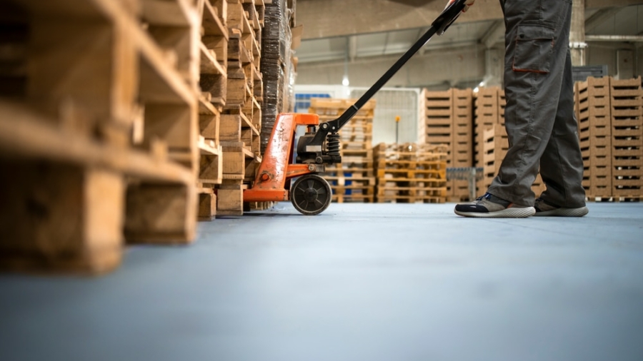 Working,At,Warehouse.,Low,Angle,View,Of,Unrecognizable,Worker,Lifting