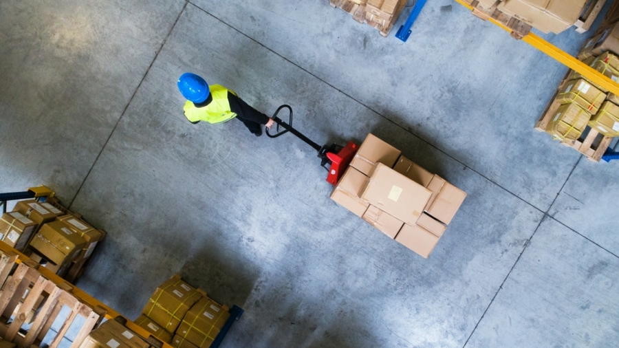 Male,Warehouse,Worker,Pulling,A,Pallet,Truck.