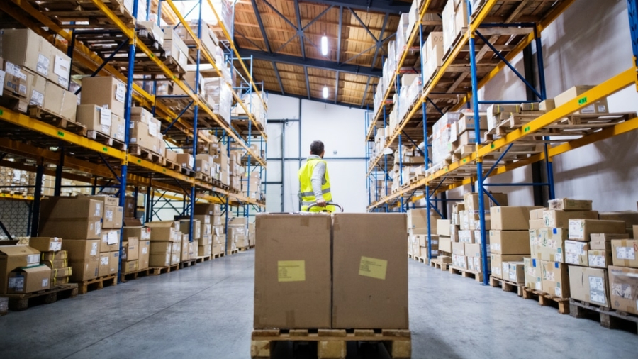 Male,Warehouse,Worker,Pulling,A,Pallet,Truck.
