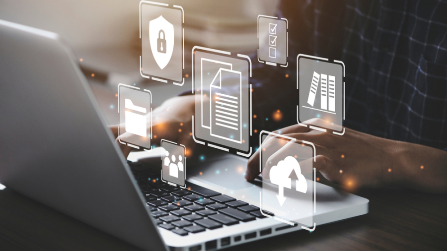 Businessman,Using,A,Computer,To,Document,Management,Concept,,Online,Documentation