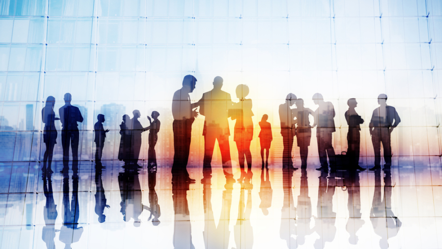 Silhouettes,Of,Business,People,Discussing,Outdoors
