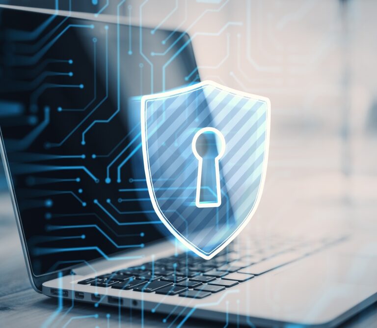 A laptop with a digital lock and shield icon overlay, symbolizing cybersecurity and data protection for Autonomous Mobile Robots, with circuit-like graphics in the background.