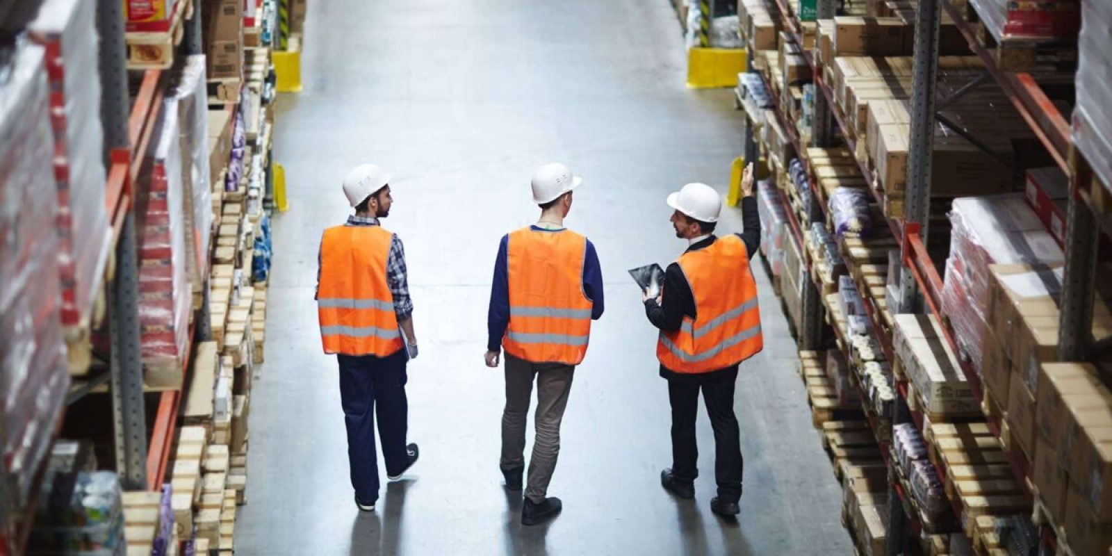 Workers walking in a warehouse