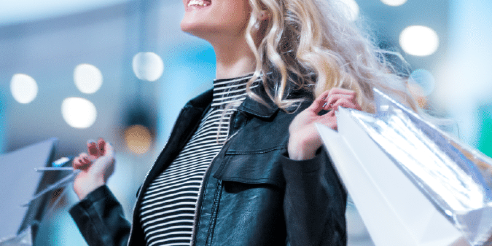 A woman holding shopping bags