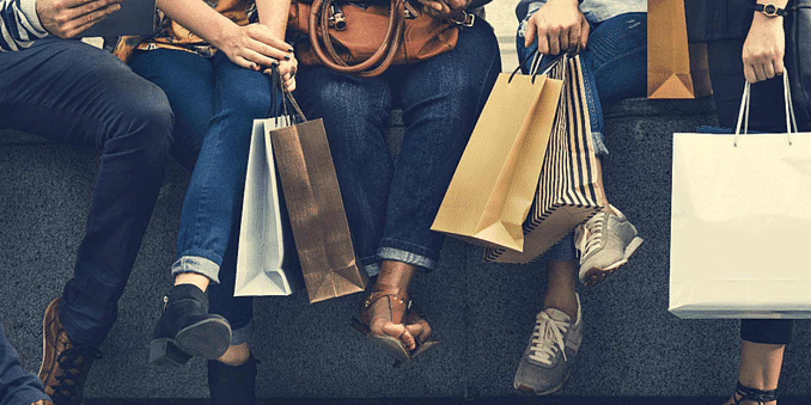 retail shoppers with shopping bags