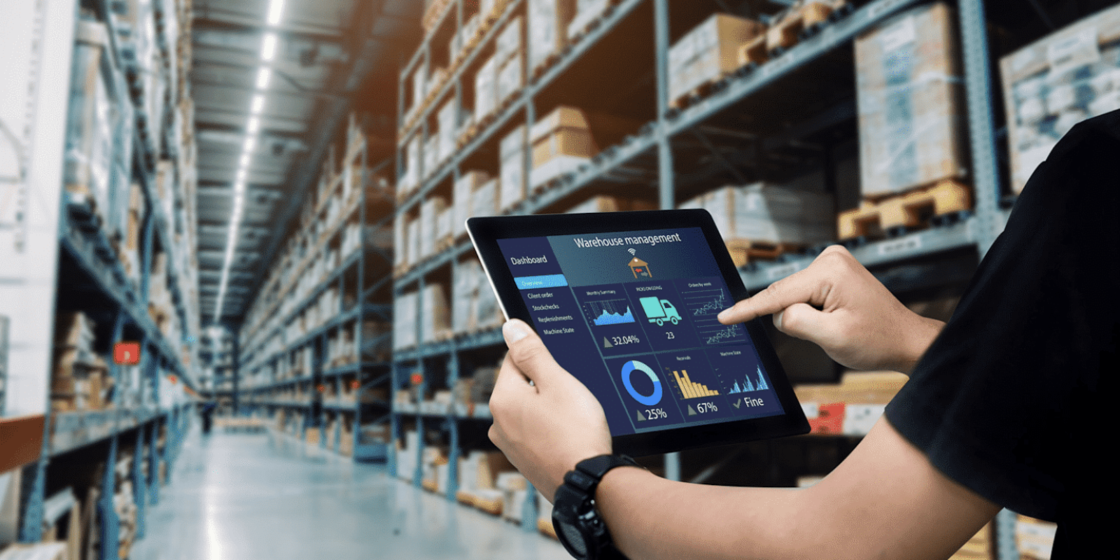 A warehouse automation worker guiding a pallet shuttle.
