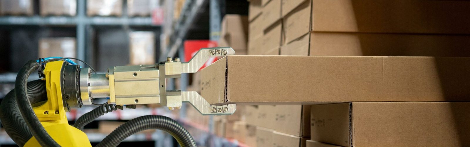 Warehouse robotics moving a package