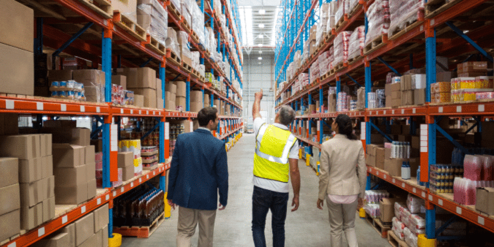 Workers discussing facility real estate design