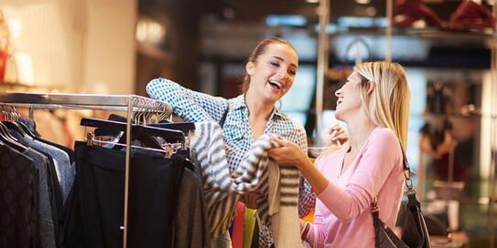 Happy young girls in a shopping mall