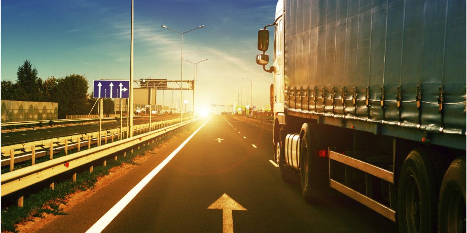 A truck transporting products on the highway