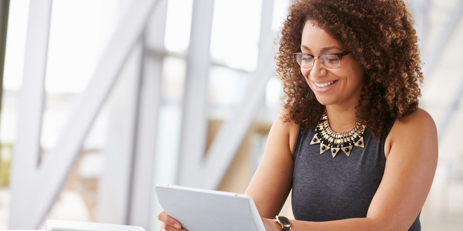 woman using microsoft power platform to save time with code application