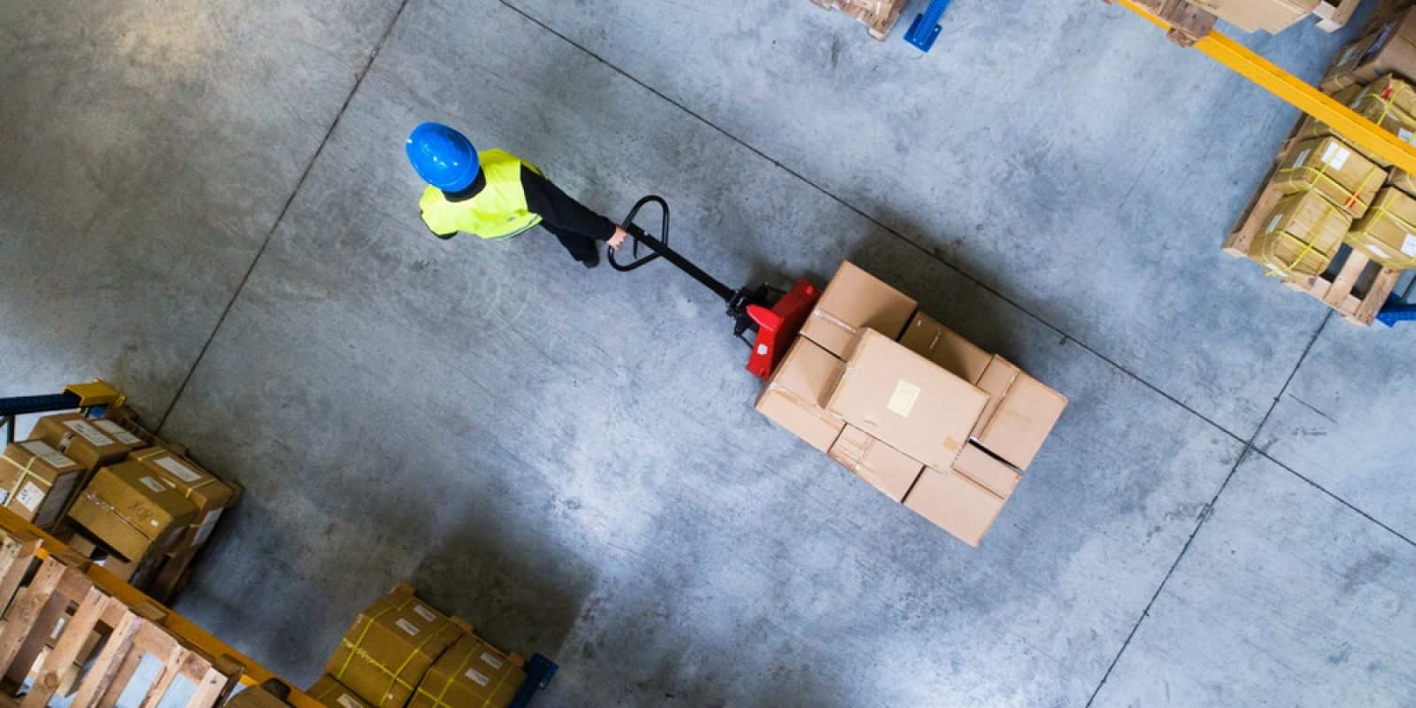 Male,Warehouse,Worker,Pulling,A,Pallet,Truck.