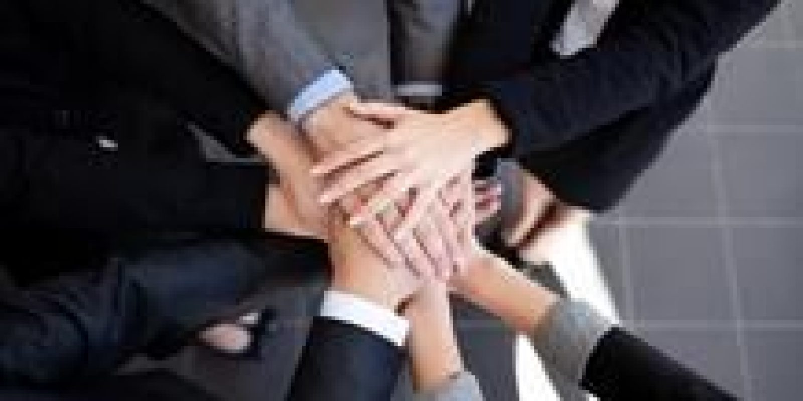 Coworkers displaying unity