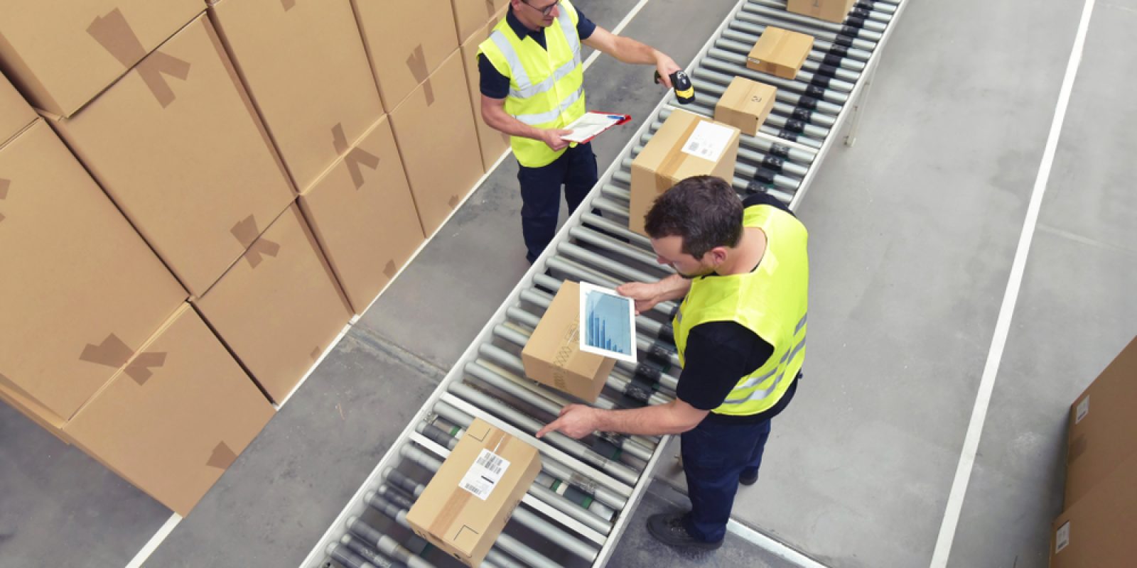 Worker,In,A,Warehouse,In,The,Logistics,Sector,Processing,Packages