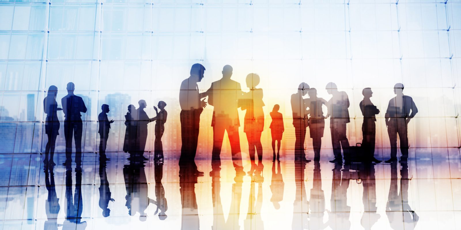 Silhouettes,Of,Business,People,Discussing,Outdoors