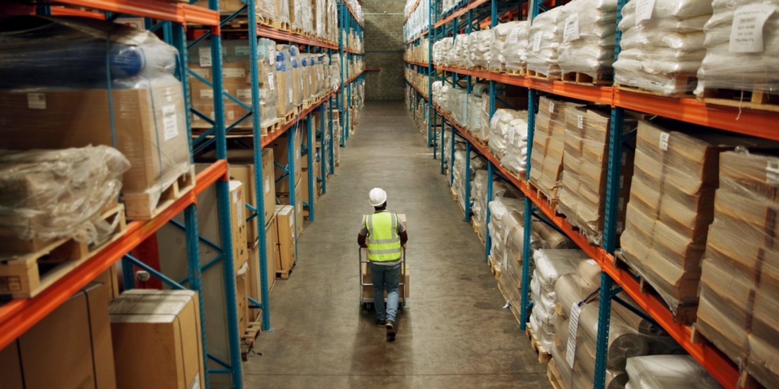 Warehouse,,Shipping,And,Man,Walking,In,A,Distribution,,Freight,And