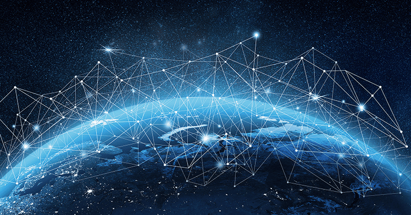 A view of Earth from space with glowing network lines and nodes connecting various points, symbolizing global communication and digital connectivity across the planet.