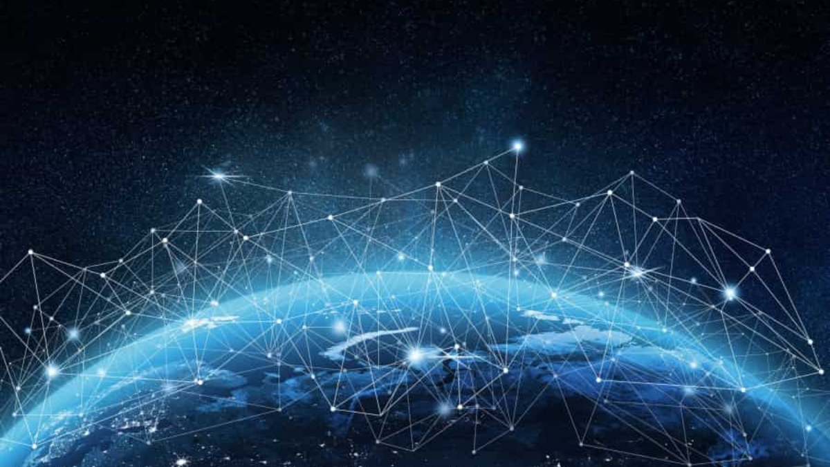 View of Earth from space with a network of glowing lines and points connecting across the surface, symbolizing global digital connectivity and data exchange on a dark, starry background.