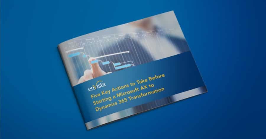 A brochure on a blue surface titled “Five Key Actions to Take Before Starting a Microsoft AX to Dynamics 365 Transformation” with a blurred image of a person pointing at a digital graph.