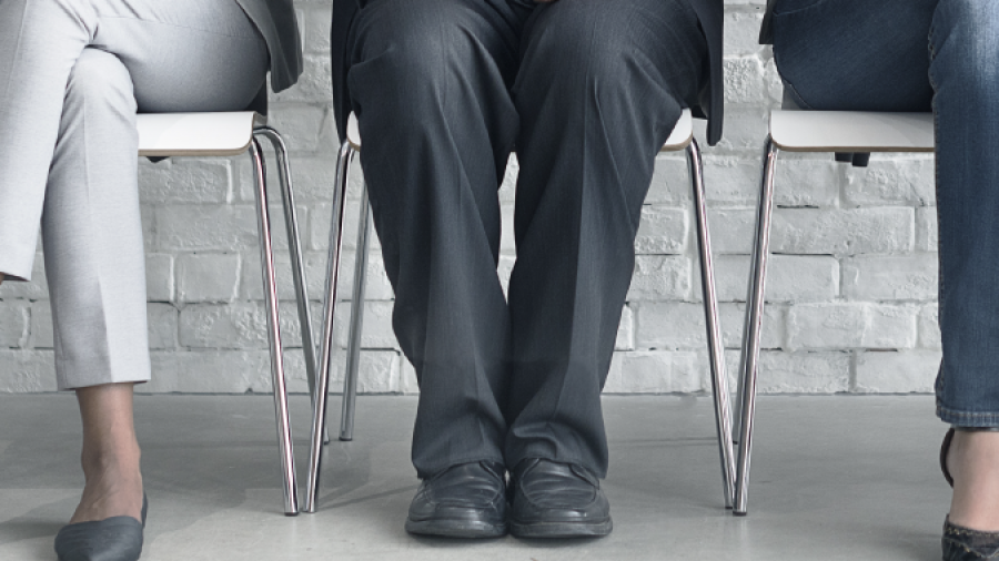 workers sitting in chairs