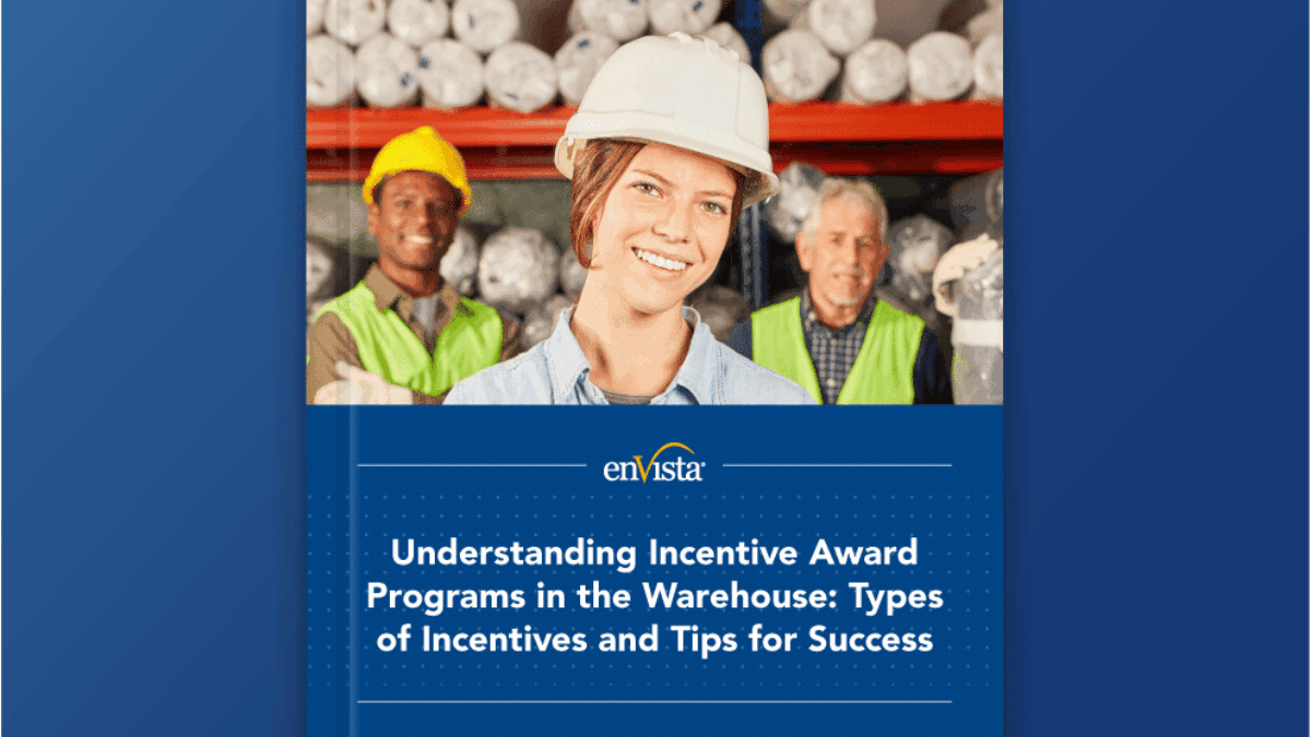 Cover image for a guide titled Understanding Incentive Award Programs in the Warehouse. Features a smiling woman in a hard hat and safety vest, with two warehouse workers and shelves of rolled materials in the background.