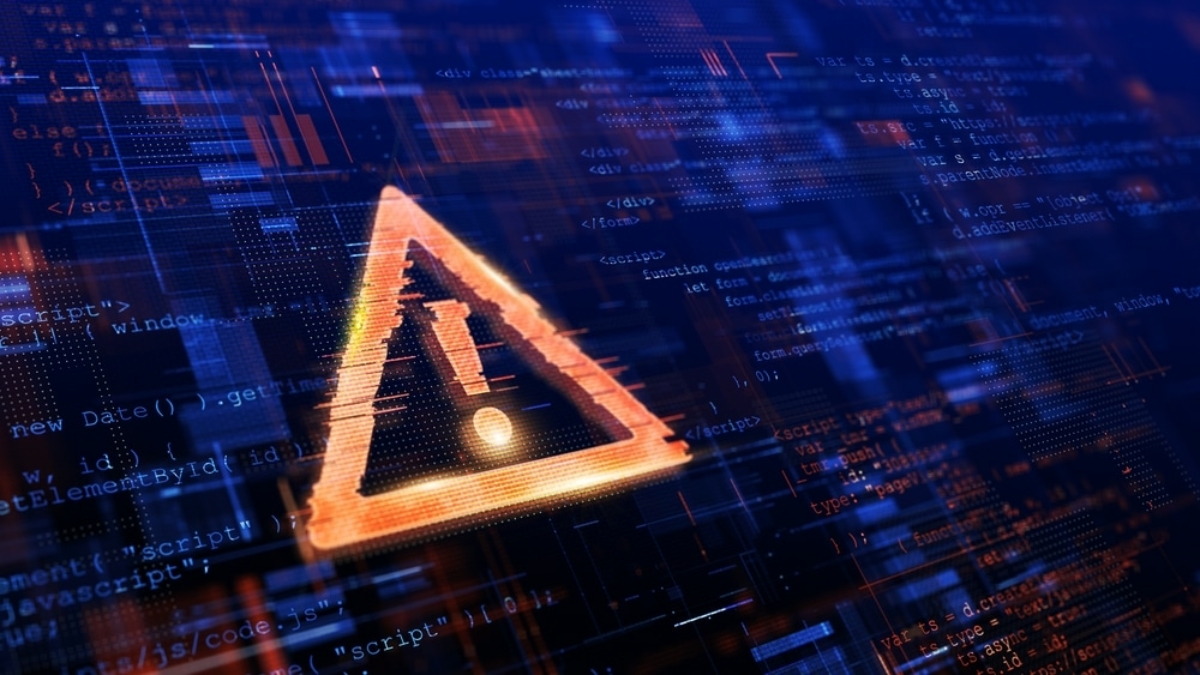 A glowing warning triangle with an exclamation mark appears over digital code and abstract circuit patterns, symbolizing a cybersecurity threat or digital security alert.