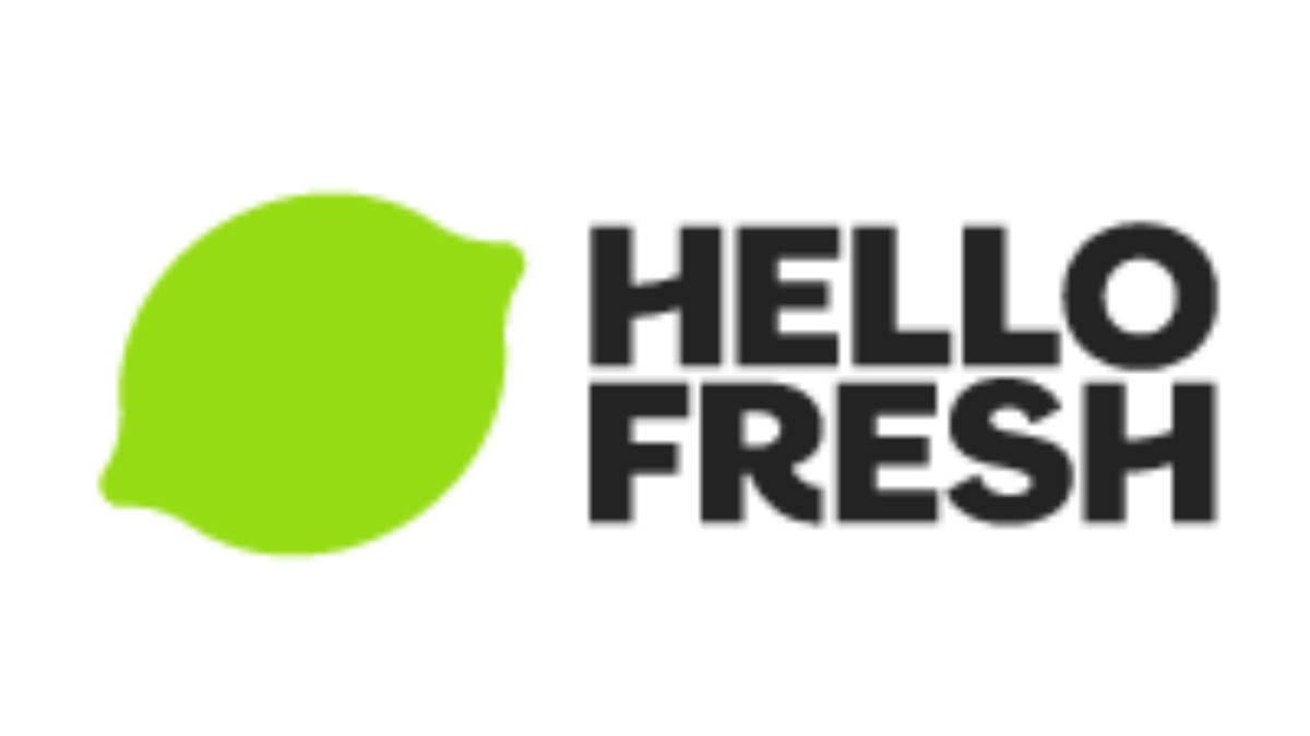 HelloFresh logo featuring a bright green lime graphic on the left and bold black text HELLO FRESH on the right, set against a light gray background.