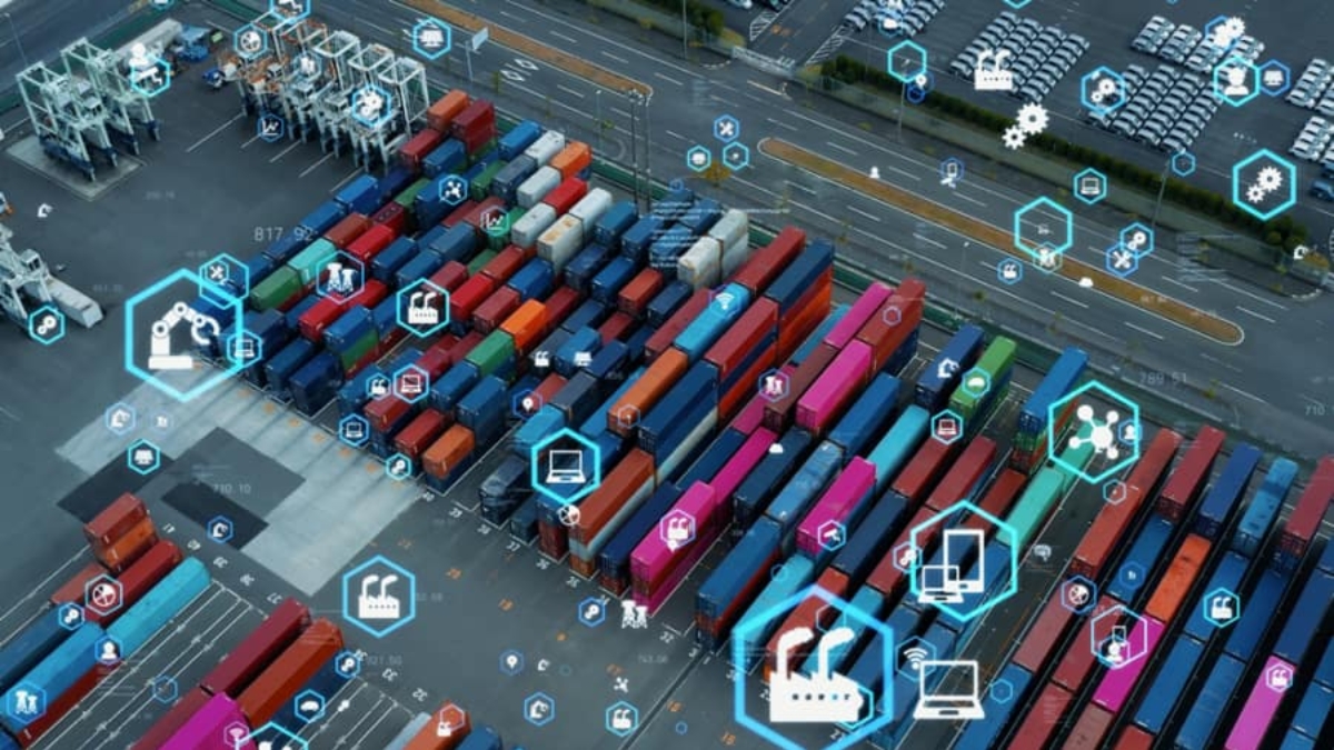 Aerial view of a shipping container yard with colored containers and overlayed digital icons representing technology, automation, and connectivity in logistics and supply chain management.