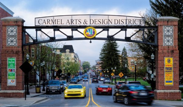 cars under a carmel sign